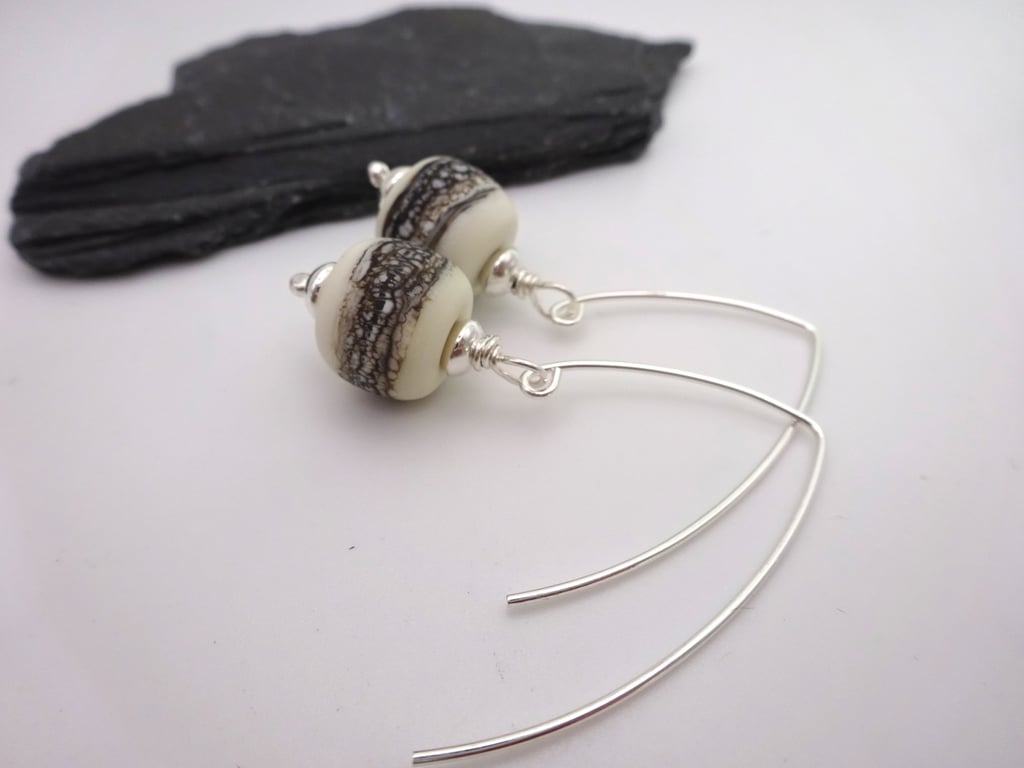 ivory wrapped lampwork glass earrings