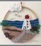 A lighthouse, crocheted art