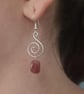 Sterling silver wire wrapped spiral dangle earrings with cherry quartz chunks - Image 1
