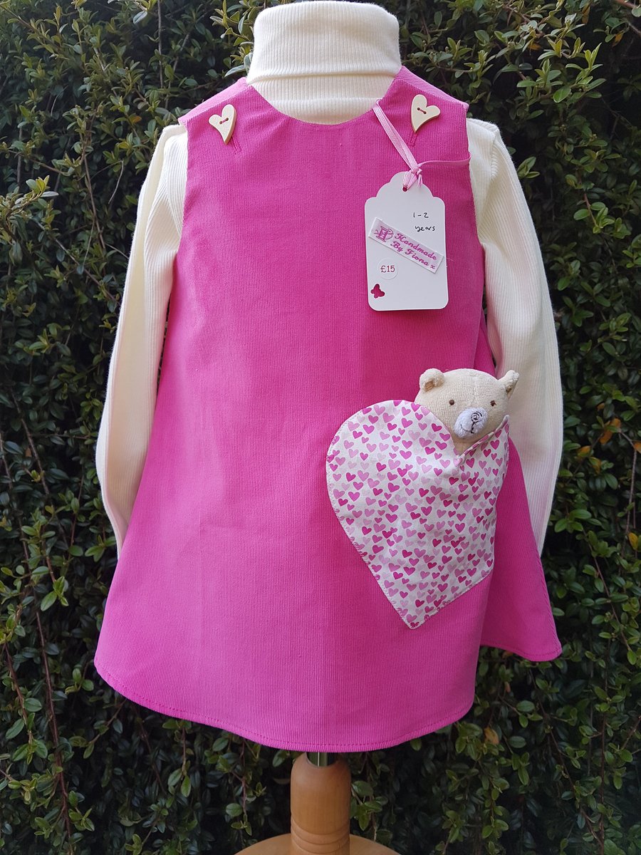 Age: 1-2y. Rose-pink baby needlecord pinafore dress. 