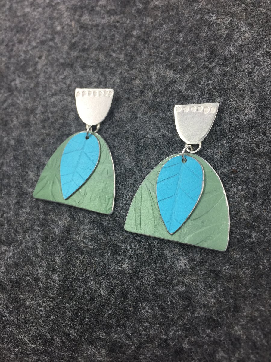 Handmade silver and aluminium textured earrings in green and blue