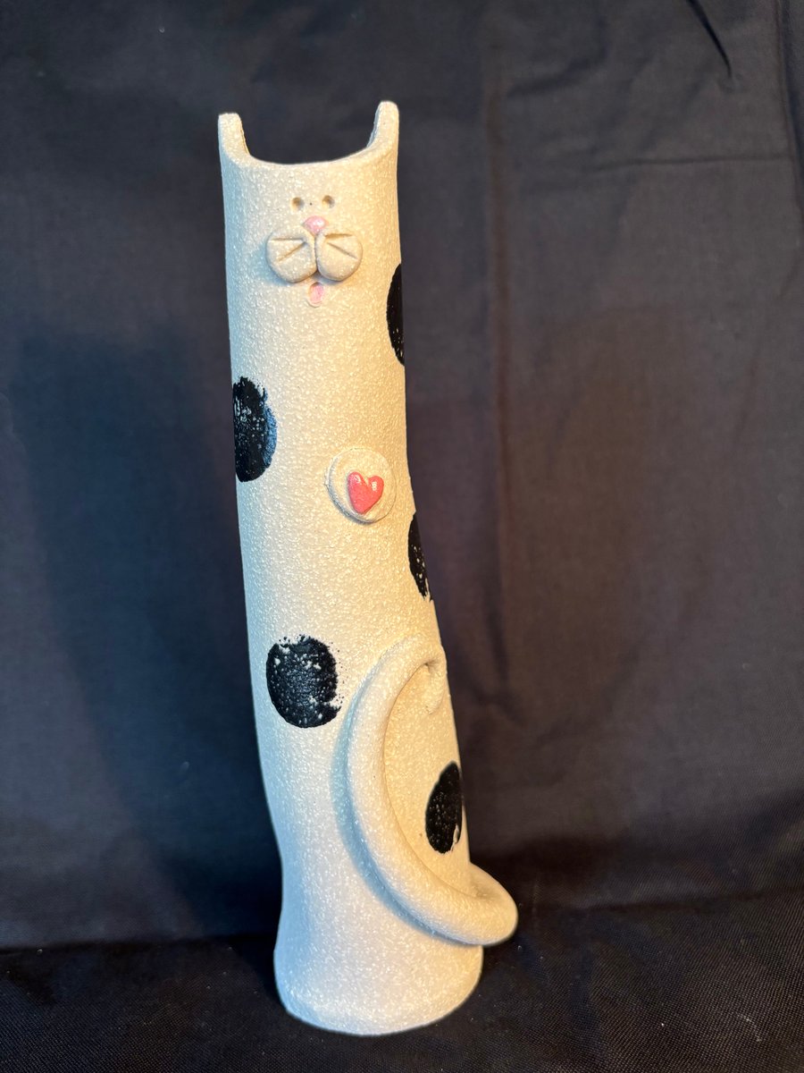 Tall black and white cat vase