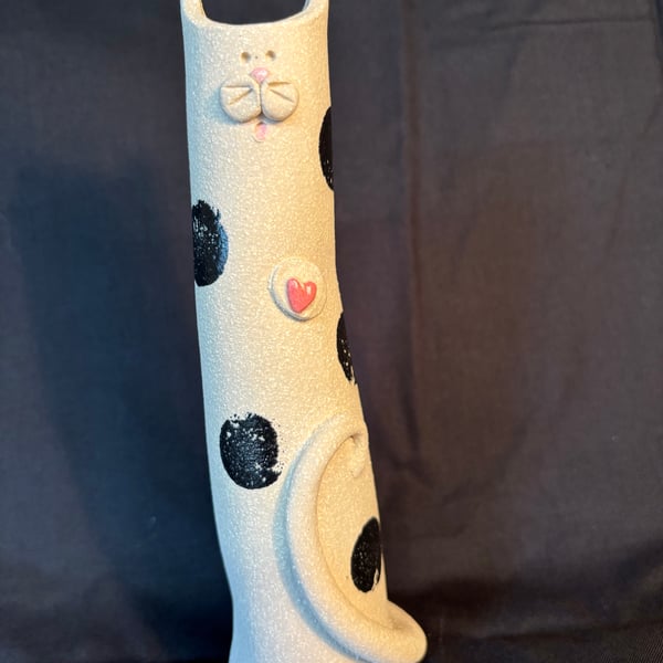 Tall black and white cat vase