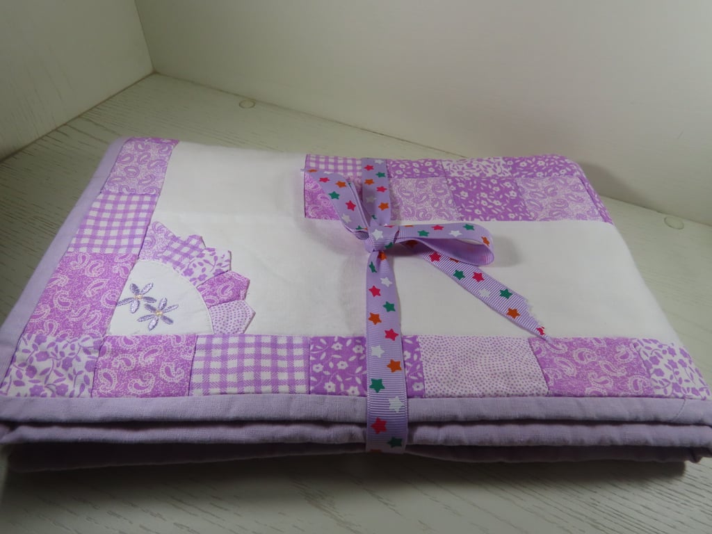Patchwork Quilt for the Nursery in Lilac Fabric.