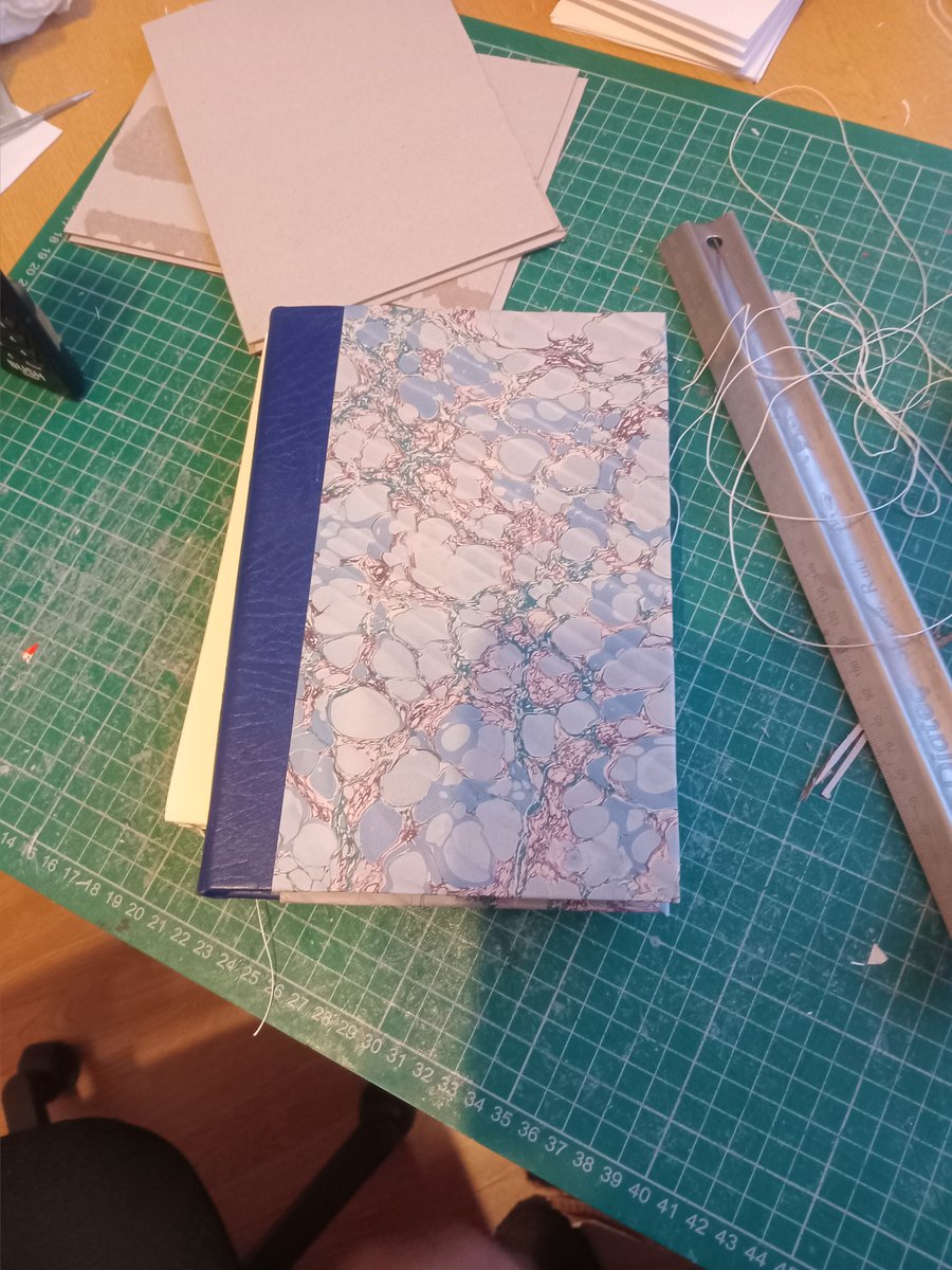 A5 journal imperfectly handmade from scratch. Blank unlined paper.