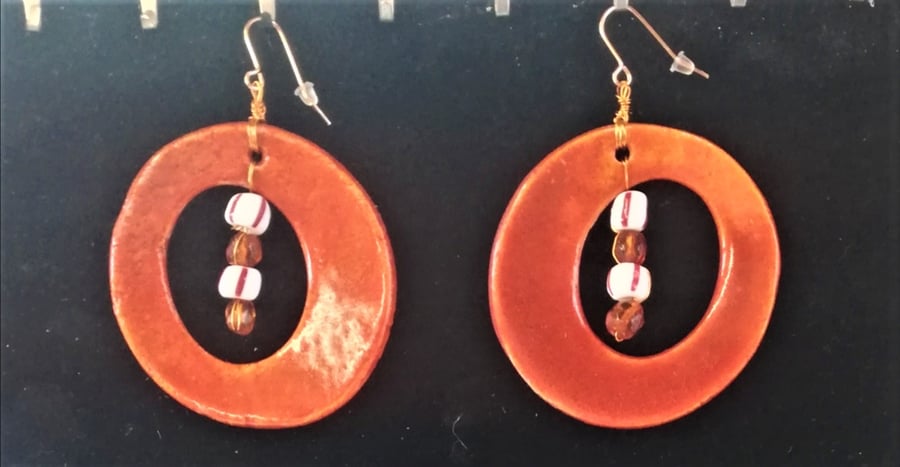 Delicious round and dangling ceramic earrings