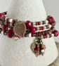Deep red handmade Czech glass memory wire wrap bracelet with leaf charms - Image 5