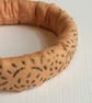 Bangle, bracelet, fabric covered, slip on, peach with gold embossed pattern - Image 4
