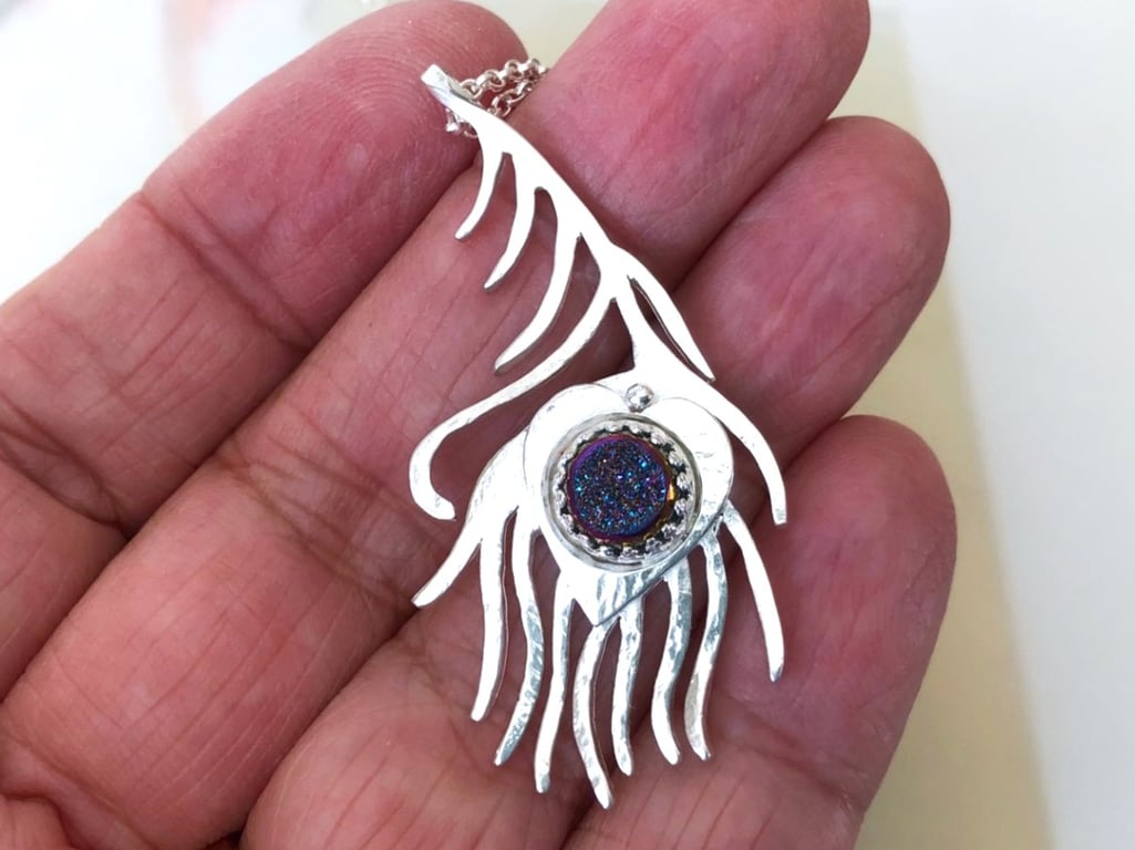 Silver Peacock Feather Pendant set with a Titanium Rainbow Drusy Cabochon