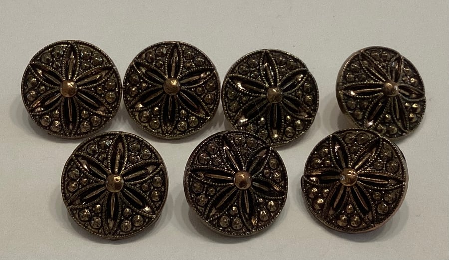 Buttons, brass coloured, metallic, textured, patterned set of seven