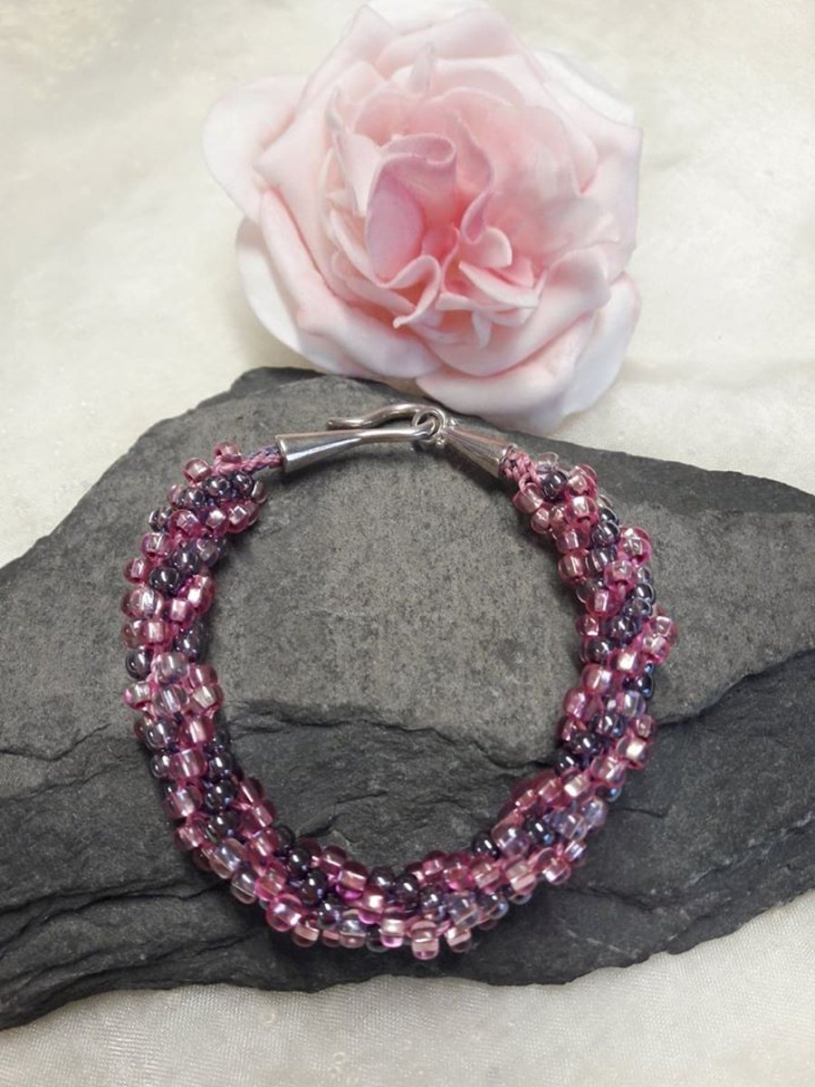 SALE Pink and purple beaded bracelet - Kumihimo