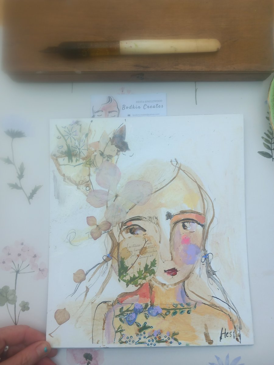 Whimsical collage, semi abstract portrait of a girl. In inks and mixed media