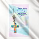 A cross hanging or bookmark