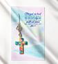 A cross hanging or bookmark