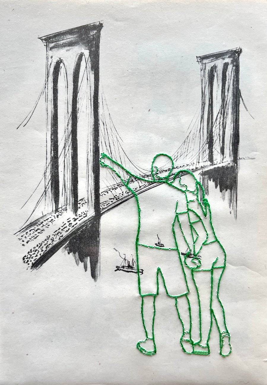 Hand embroidered vintage book page