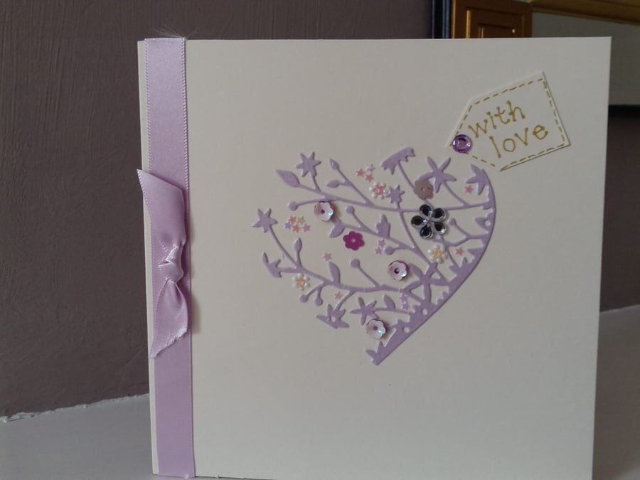 Delicate heart with love card