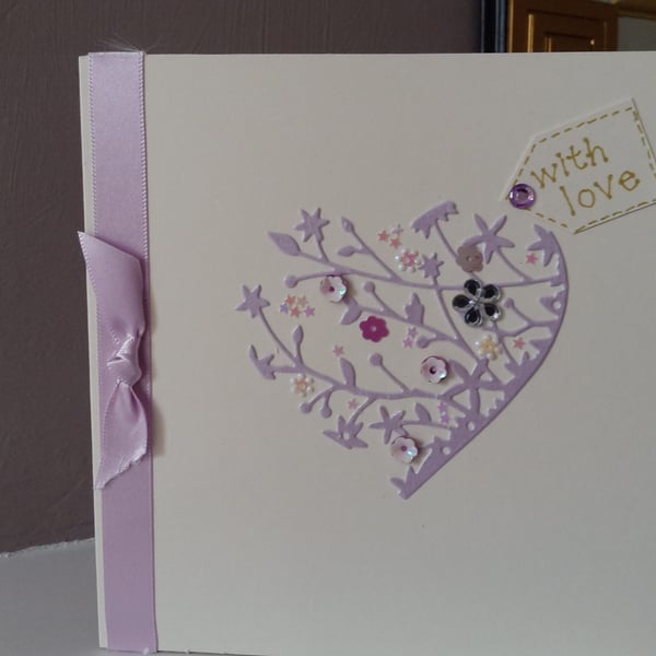 Delicate heart with love card