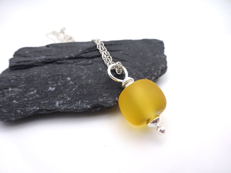 light amber lampwork glass pendant necklace