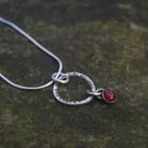 Textured Circle Silver Pendant with Garnet  Drop