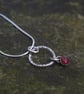 Textured Circle Silver Pendant with Garnet  Drop - Image 1