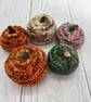 Hand knitted mini pumpkin pin cushion variegated orange - Image 2