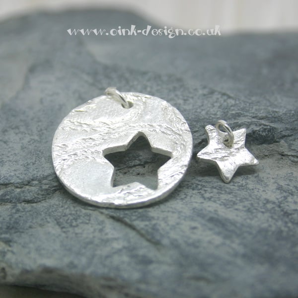 Mummy and Me. Two fine silver patterned pendants