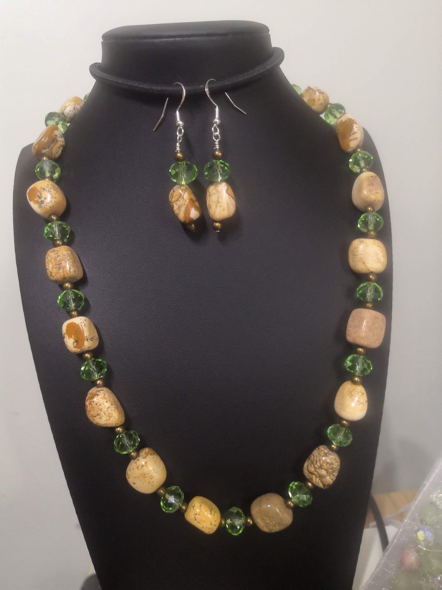 Upcycled necklace of beautiful polished stone and green faceted glass