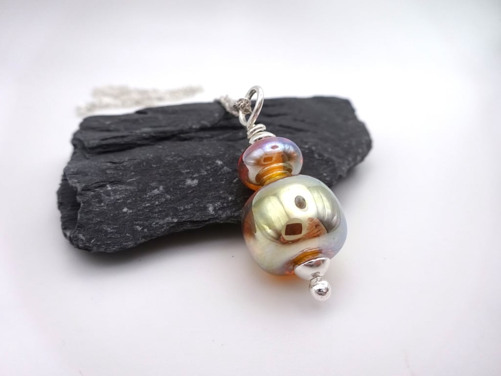 gold lampwork glass pendant necklace
