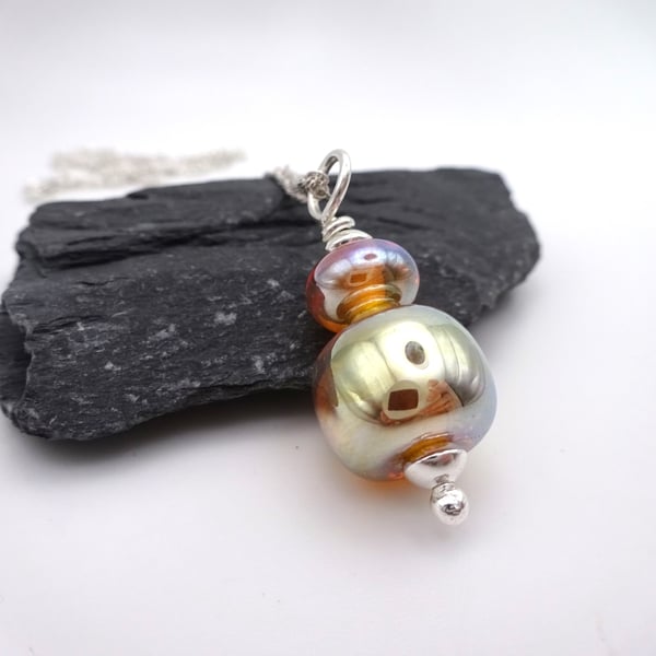 gold lampwork glass pendant necklace