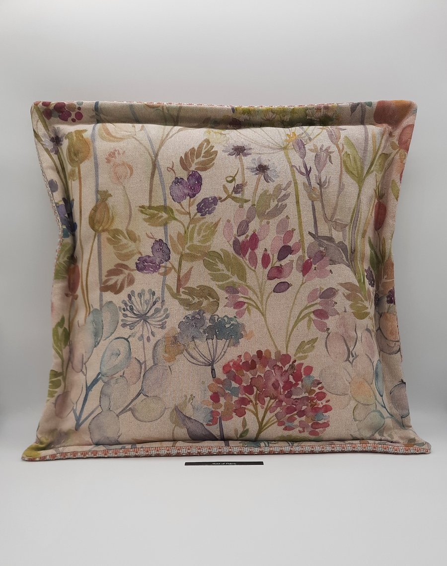 Flange cushion cover in beige floral,  envelope back. 