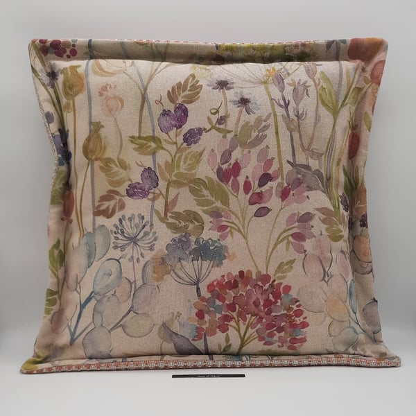 Flange cushion cover in beige floral,  envelope back. 