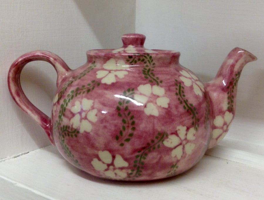 Teapot in stoneware clay with pink and green floral decoration. Free UK postage