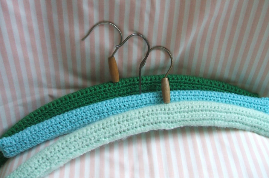 3 vintage coat hangers with new crocheted covers - blues and greens