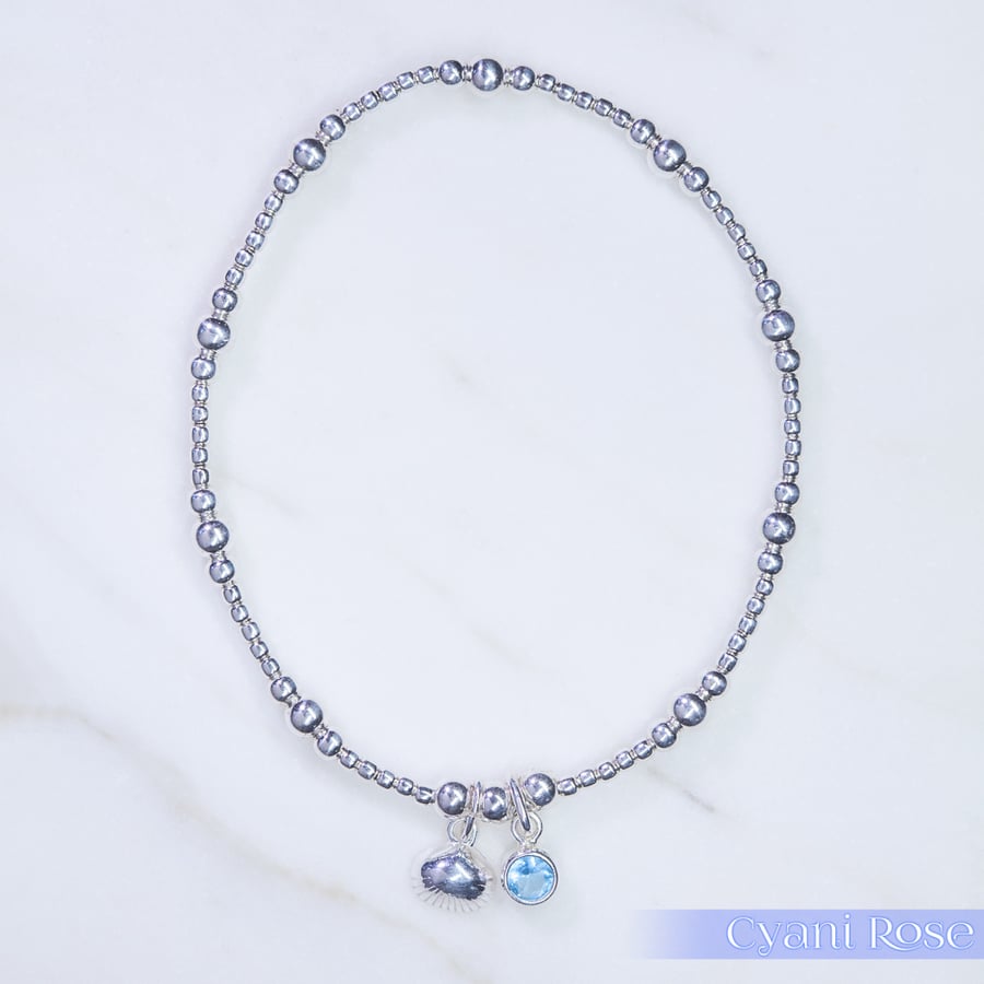 Shell Charm Bracelet Sterling Silver Stretchy blue glass handmade 