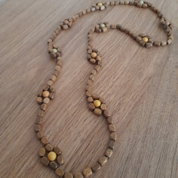 SHADES OF BROWN WOODEN FLOWER BEAD NECKLACE.