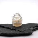 small glass jar of magic
