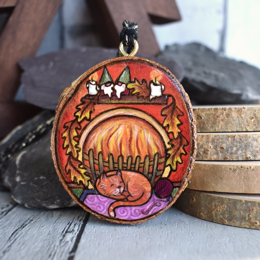 Sleeping kitty by the fire pyrography hanging wood slice decoration