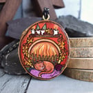 Sleeping kitty by the fire pyrography hanging wood slice decoration