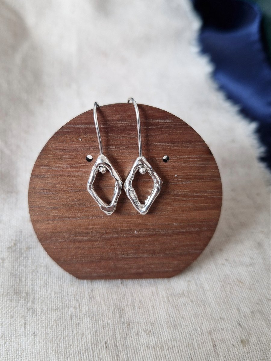 Diamond shaped sterling silver earrings from wax casting, Perfectly imperfect