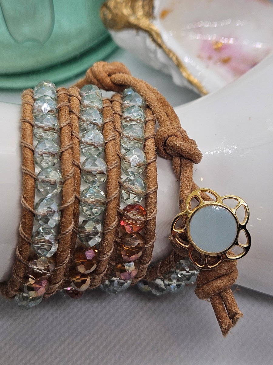 Pale blue and bronze leather triple wrap bracelet boho style with flower clasp