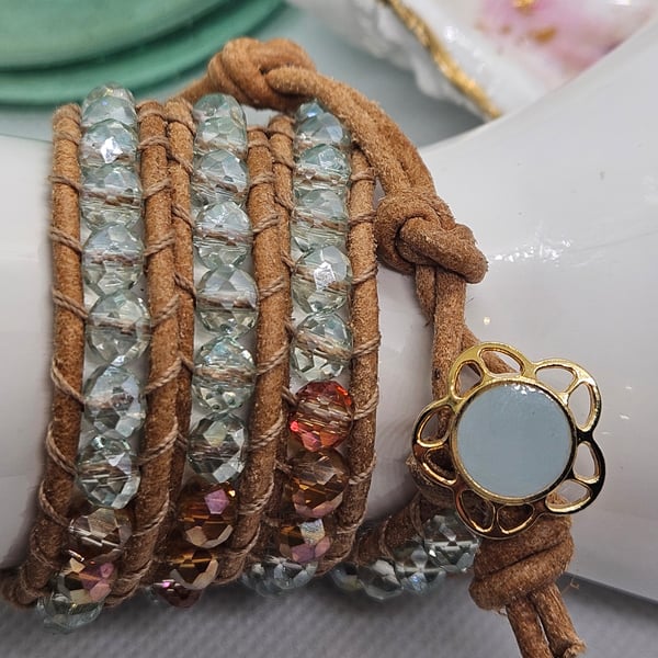 Pale blue and bronze leather triple wrap bracelet boho style with flower clasp
