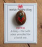 A tiny Welsh pocket cwtch - Heart & daffodil on a smooth pebble