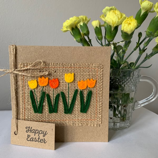 Easter greeting card with row of orange and yellow flowers. Handmade. Wool felt.