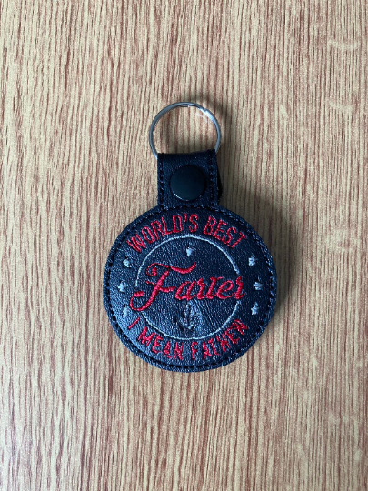 1135. World’s best farter - father keyring.