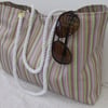 Tote beach bag in multi coloured stripes with rope handles