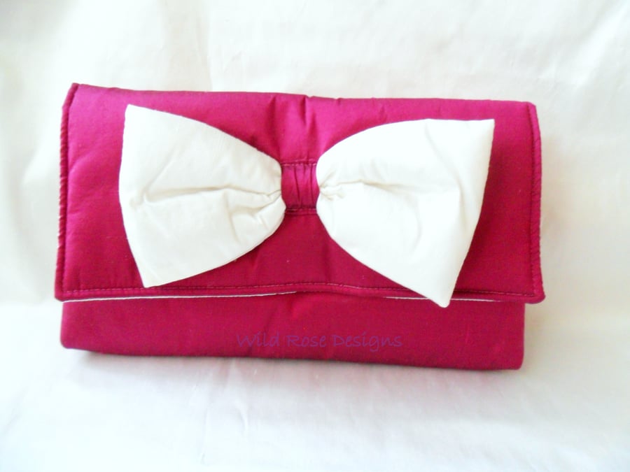 SECONDS SUNDAY Cerise silk clutch.