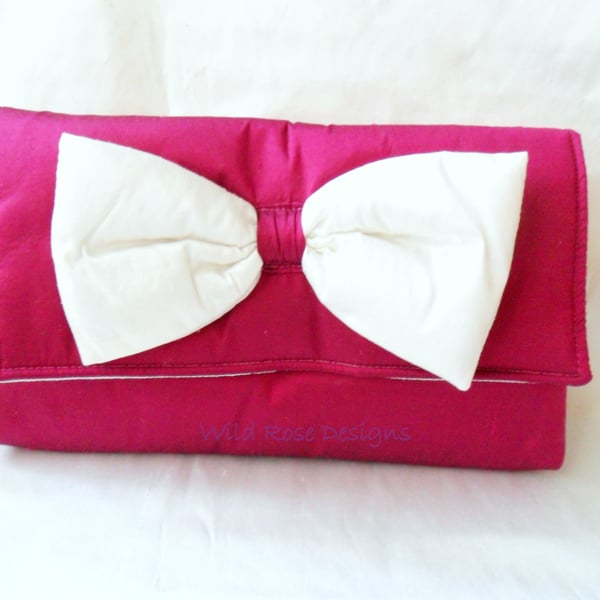 SECONDS SUNDAY Cerise silk clutch.