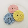 Set of three large ceramic buttons