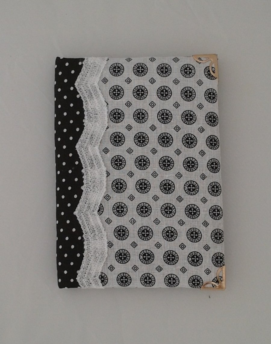 Padded, fabric covered A6 notebook (black))