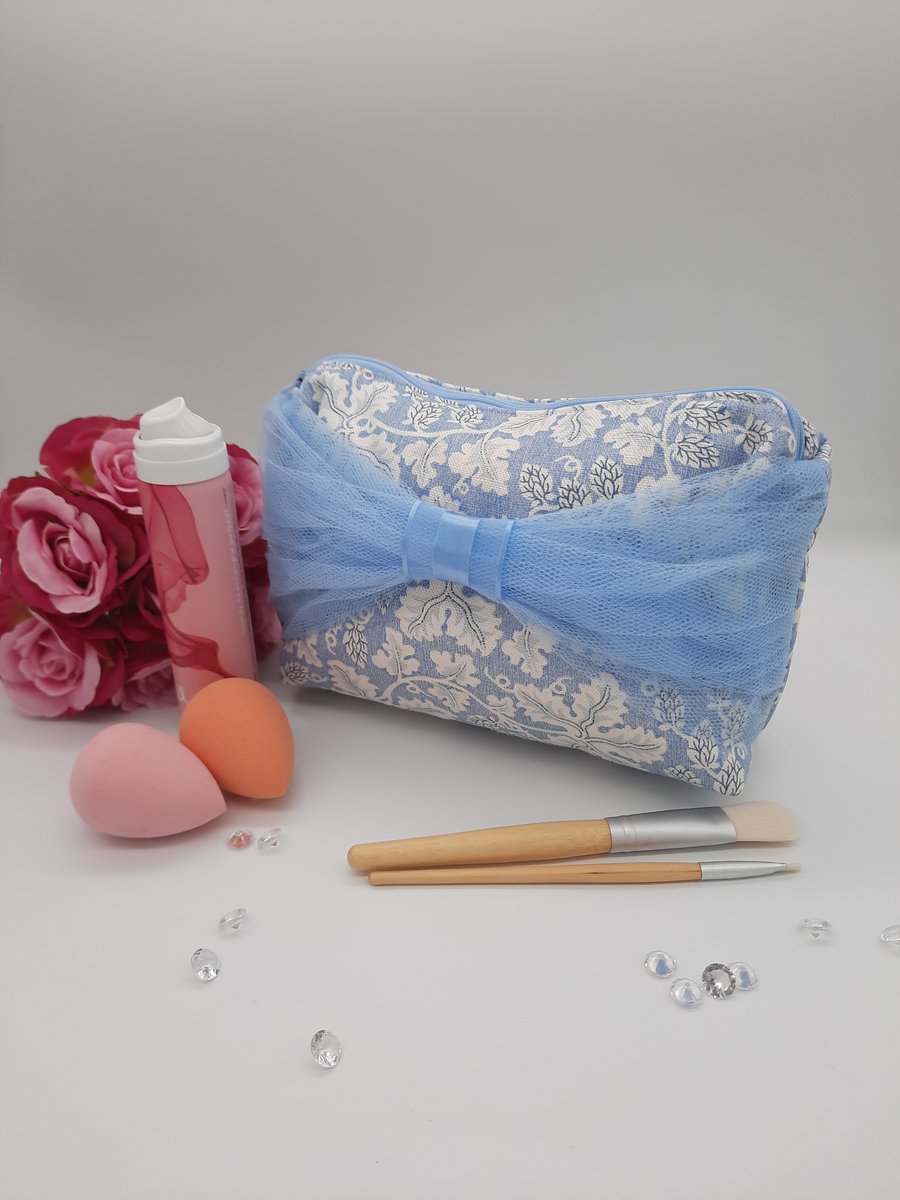Blue tulle bow makeup bag, self lined, zipped pouch. 